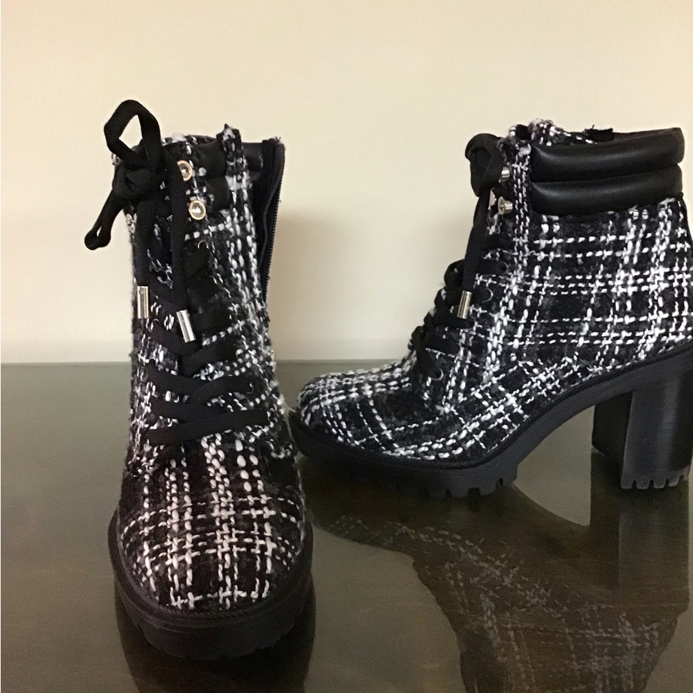 Jennifer Lopez Black and White Lace Up Boots